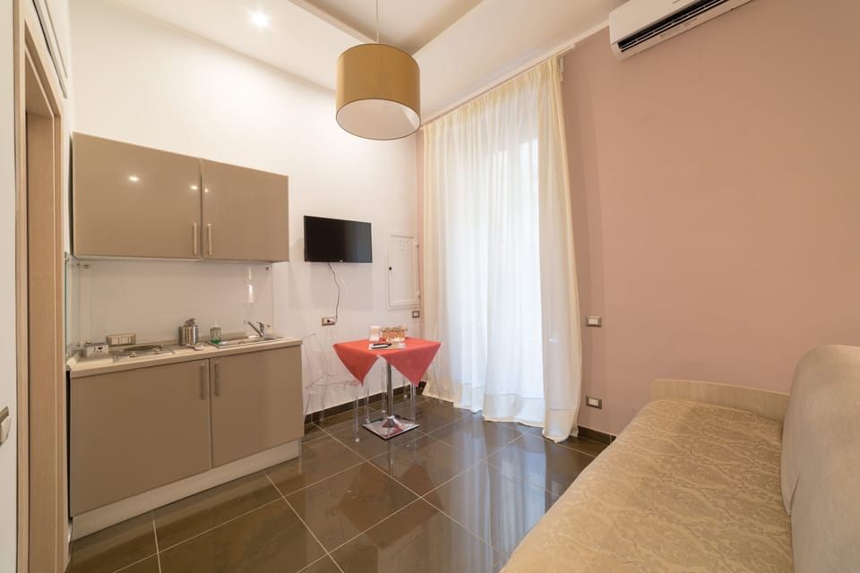 Superior Studio | Living area | Flat-screen TV