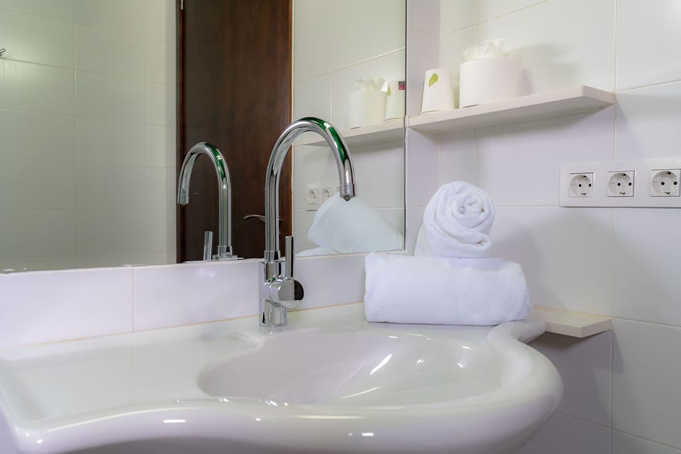 Shower, towels, soap, shampoo