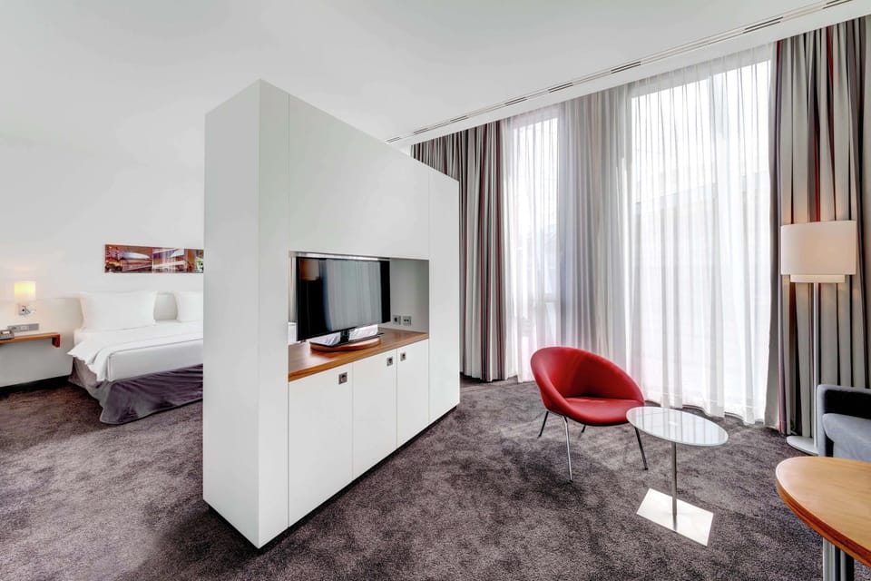 Junior Room, 1 King Bed | Premium bedding, in-room safe, desk, blackout drapes