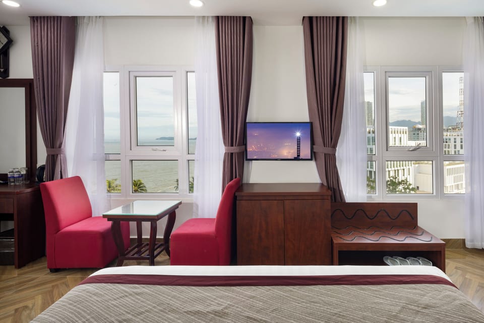 Deluxe Double Room, Sea View | Premium bedding, minibar, in-room safe, desk