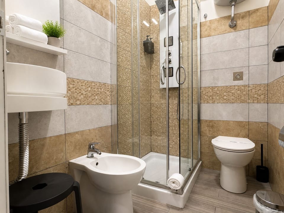 Shower, free toiletries, hair dryer, towels