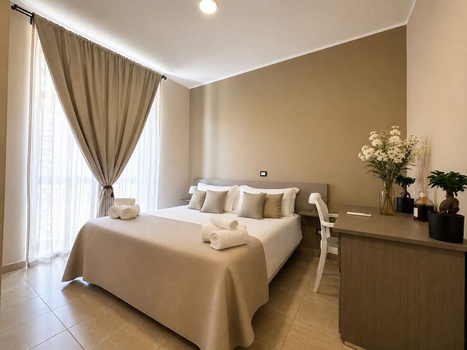 Junior Suite, City View | Desk, blackout drapes, bed sheets