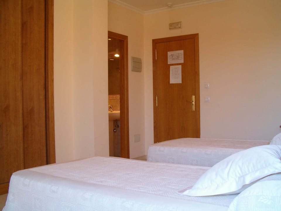 Double or Twin Room | Desk, blackout drapes, iron/ironing board, rollaway beds