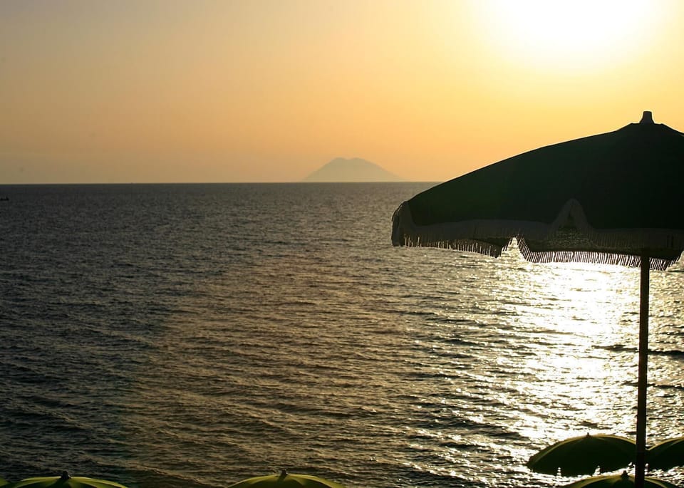 Private beach, white sand, sun loungers, beach umbrellas