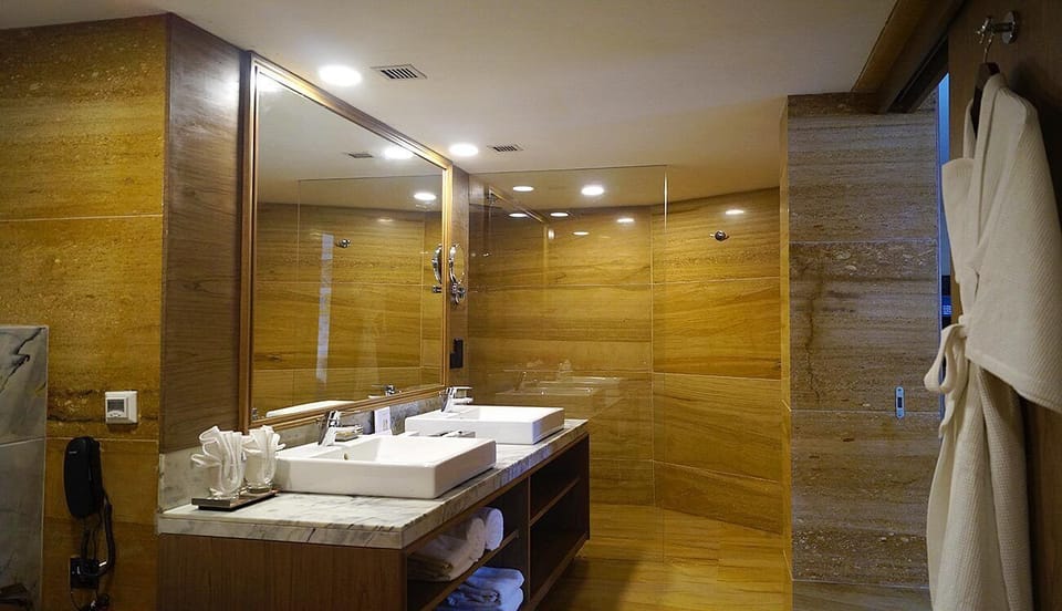 Attic Mall Road or City View | Bathroom | Shower, free toiletries, hair dryer, bathrobes