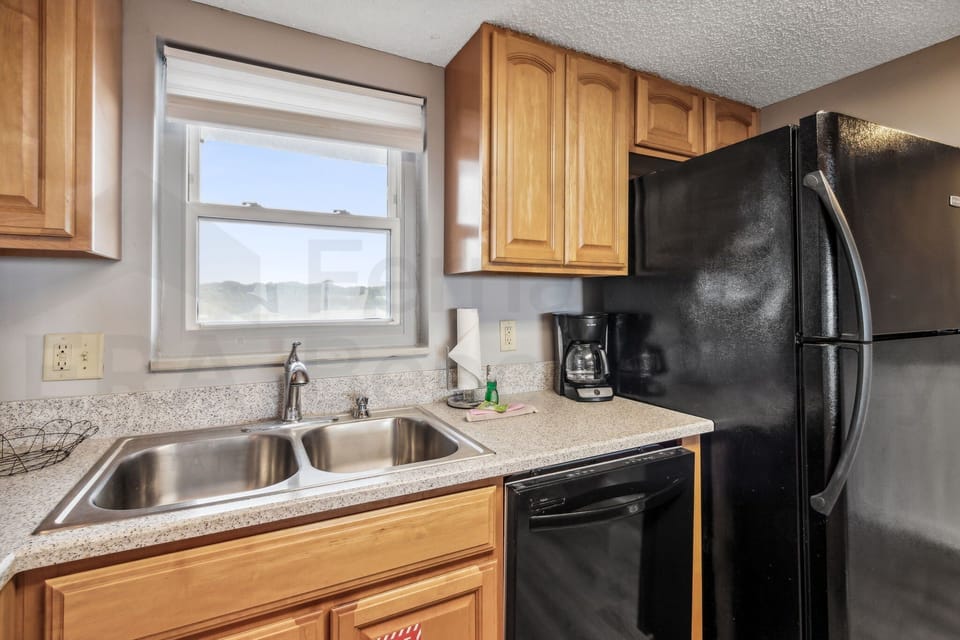 Condo, 2 Bedrooms | Private kitchen | Full-size fridge, microwave, oven, stovetop