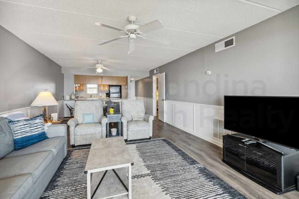 Condo, 2 Bedrooms | Living area | Flat-screen TV, DVD player