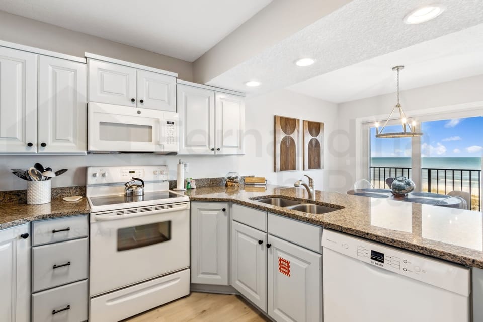 Condo, 2 Bedrooms | Private kitchen | Full-size fridge, microwave, oven, stovetop