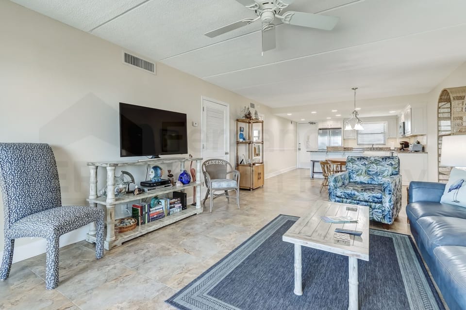 Condo, 2 Bedrooms | Living area | Flat-screen TV, DVD player