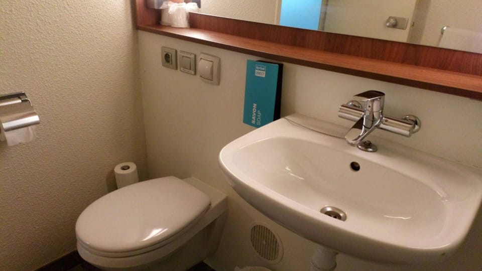 Shower, eco-friendly toiletries, hair dryer, towels