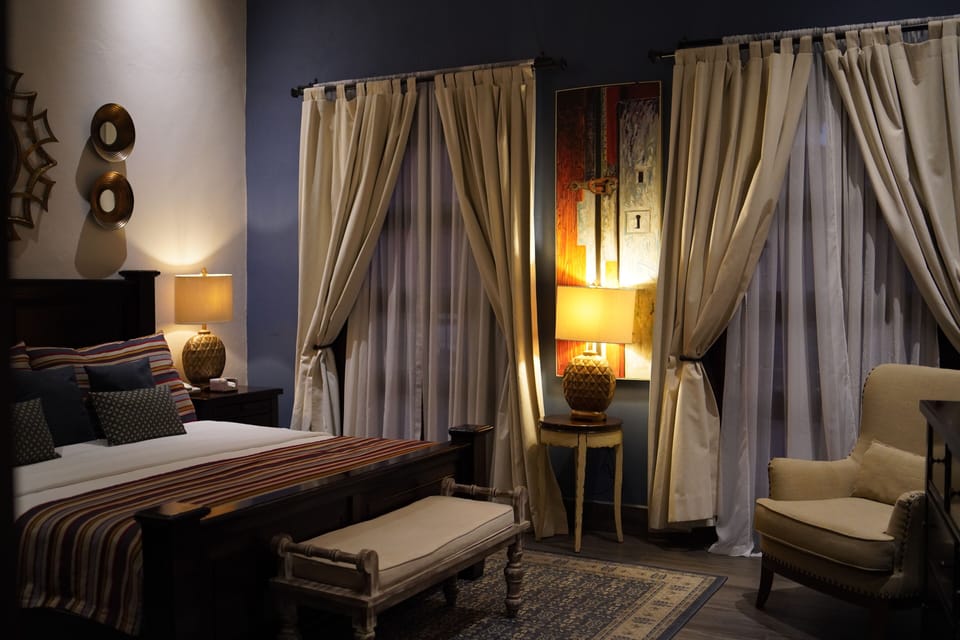 Deluxe Single Room, 1 King Bed | In-room safe, desk, iron/ironing board (on request), cribs (free)