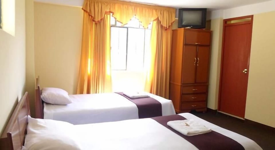 Desk, rollaway beds, free WiFi, bed sheets