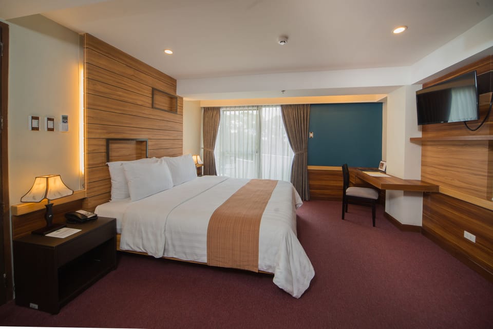 Family Room, Multiple Beds | Premium bedding, minibar, in-room safe, desk