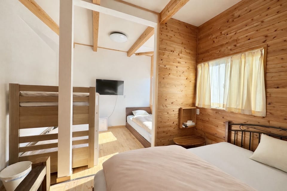 Quadruple Room, Non Smoking | Down comforters, WiFi (free), bed sheets