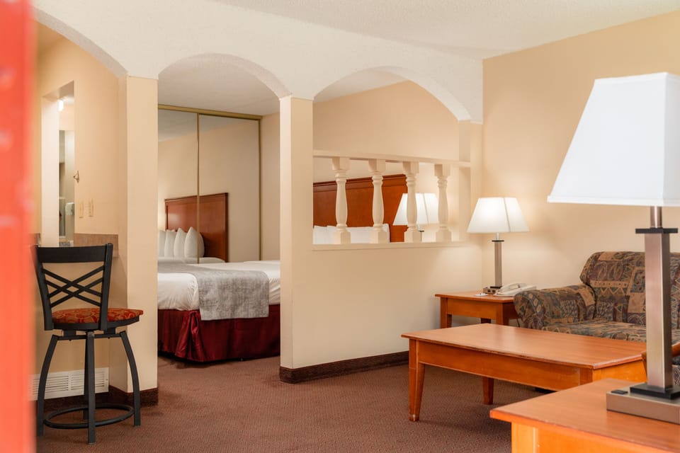 Standard Room, 2 Queen Beds, Smoking | Blackout drapes, iron/ironing board, free WiFi, bed sheets