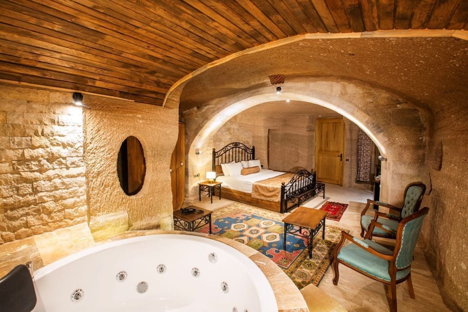 Deluxe Room (Cave ) | Premium bedding, down comforters, minibar, in-room safe