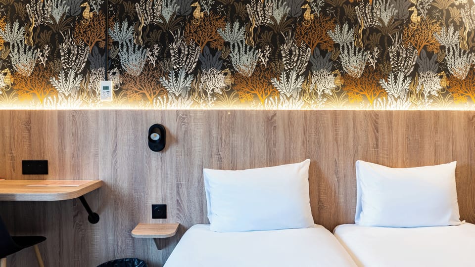 Premium bedding, desk, blackout drapes, soundproofing