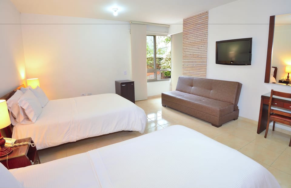 Superior Quadruple Room | Minibar, desk, iron/ironing board, free WiFi