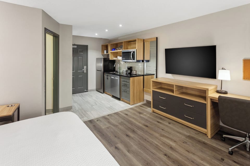 Desk, laptop workspace, blackout drapes, soundproofing