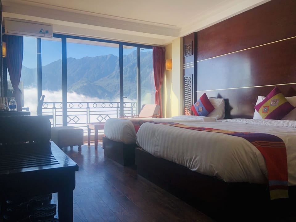 Family Triple Room, Balcony, Valley View | Minibar, in-room safe, desk, soundproofing