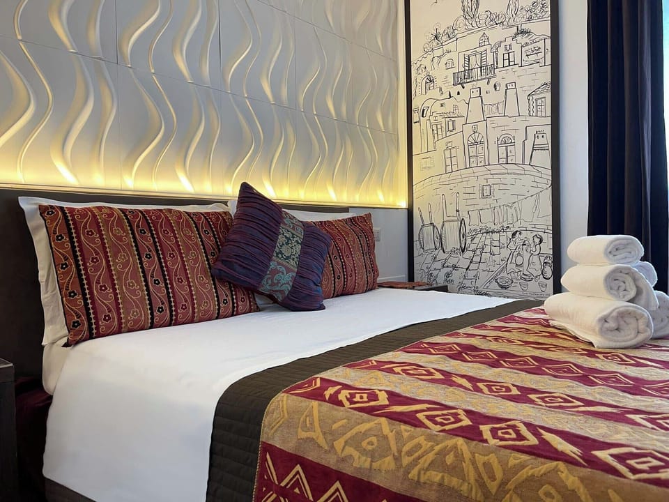 Deluxe Room, 1 Queen Bed with Sofa bed, Private Bathroom | Down comforters, memory foam beds, free WiFi, bed sheets