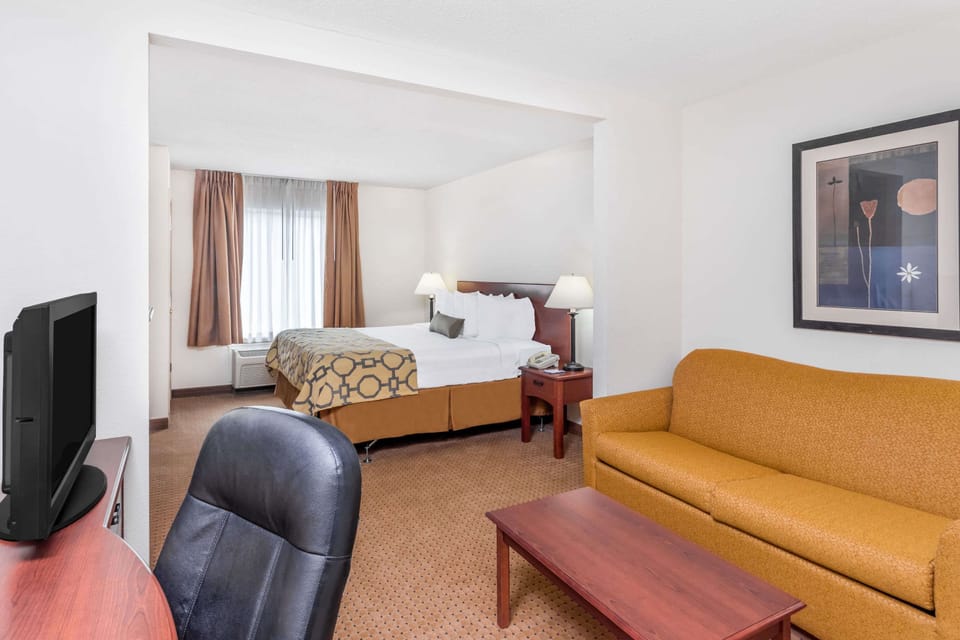 Desk, blackout drapes, iron/ironing board, cribs/infant beds