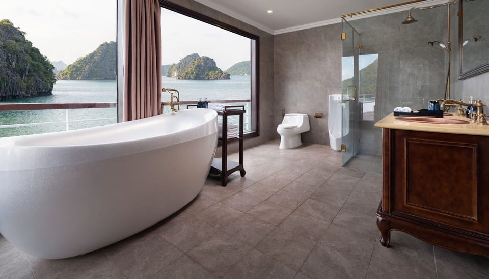 Presidential Suite, Sea View | Bathroom | Shower, hair dryer, slippers, towels