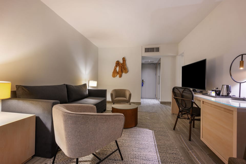 New Pool View Family Room | Minibar, in-room safe, iron/ironing board, free WiFi