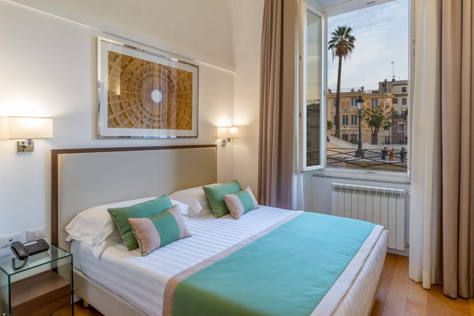 Deluxe Triple Room, City View | Premium bedding, minibar, in-room safe, desk