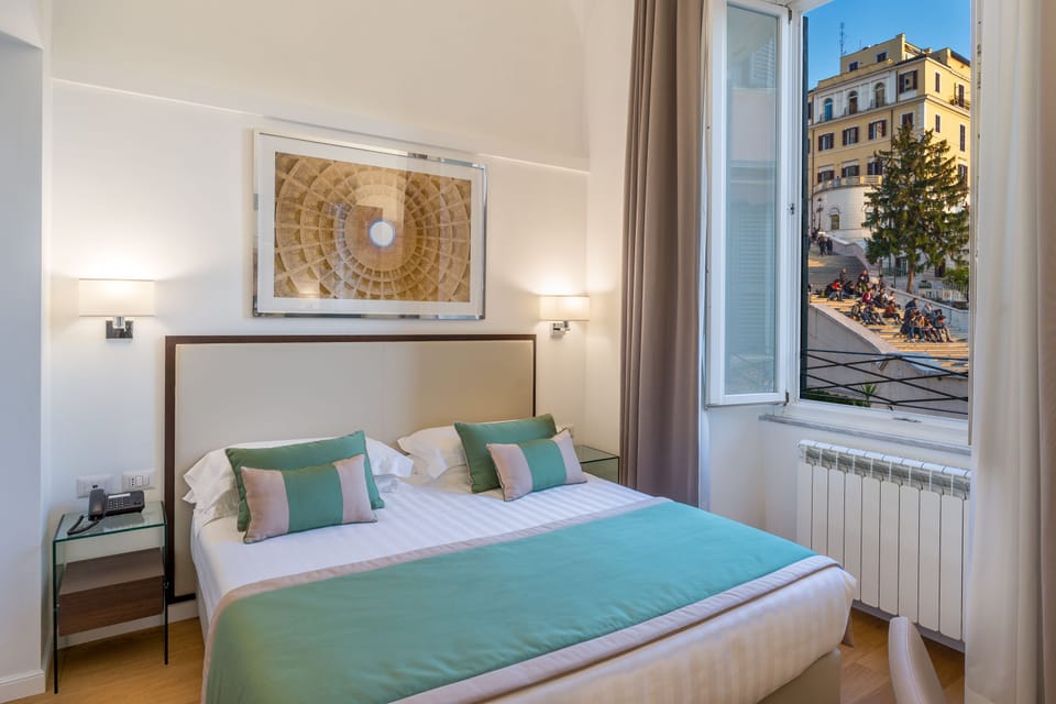 Deluxe Triple Room, City View | Premium bedding, minibar, in-room safe, desk