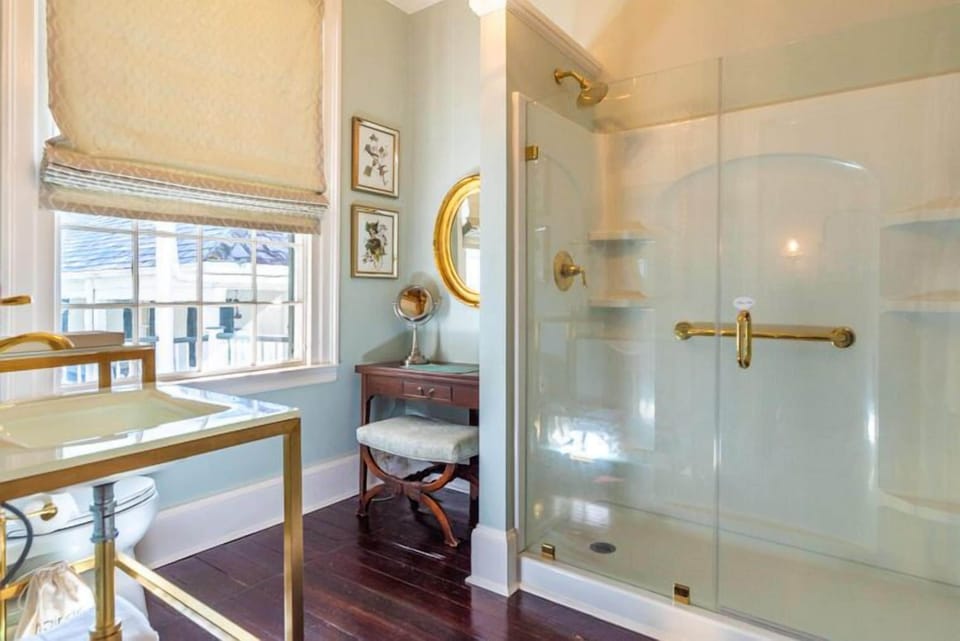 The Marjorie Room | Bathroom | Combined shower/tub, rainfall showerhead, designer toiletries, towels