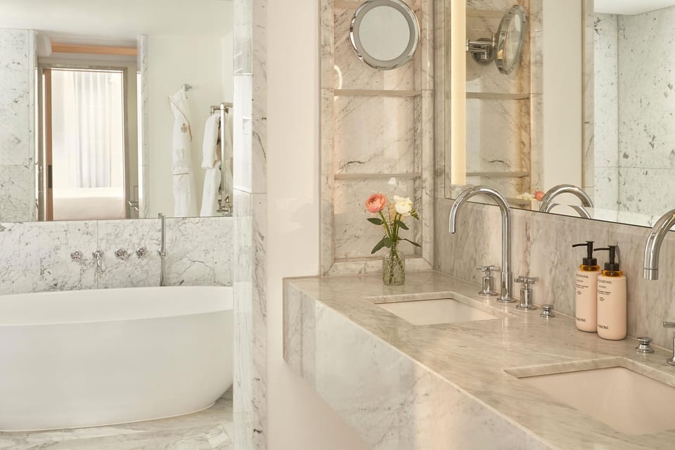 Mayfair Balcony Room | Bathroom | Combined shower/tub, designer toiletries, hair dryer, bathrobes