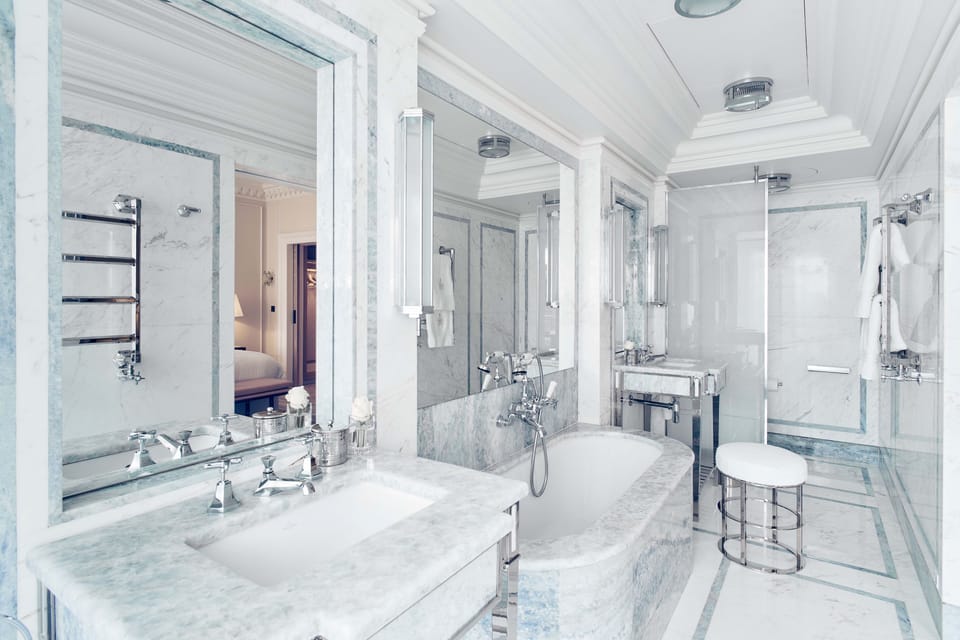Combined shower/tub, designer toiletries, hair dryer, bathrobes