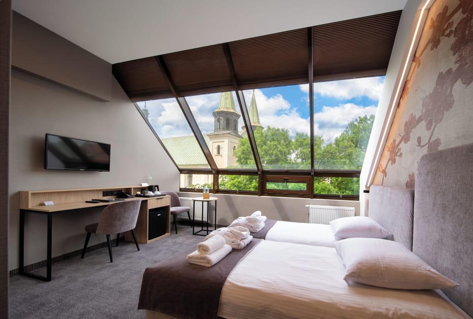 Premium Double or Twin Room | Desk, laptop workspace, blackout drapes, iron/ironing board (on request)