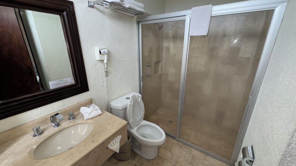 Shower, free toiletries, hair dryer (on request), towels
