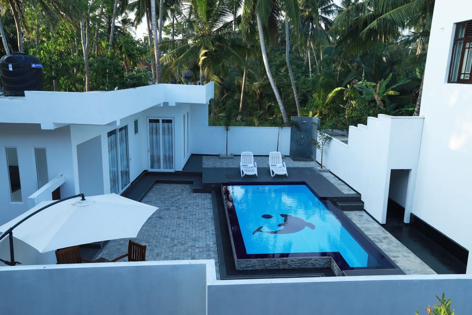 12 outdoor pools, an infinity pool, open open 24 hours, pool umbrellas