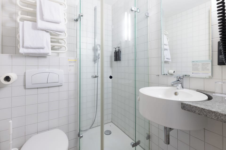 Shower, free toiletries, hair dryer, towels