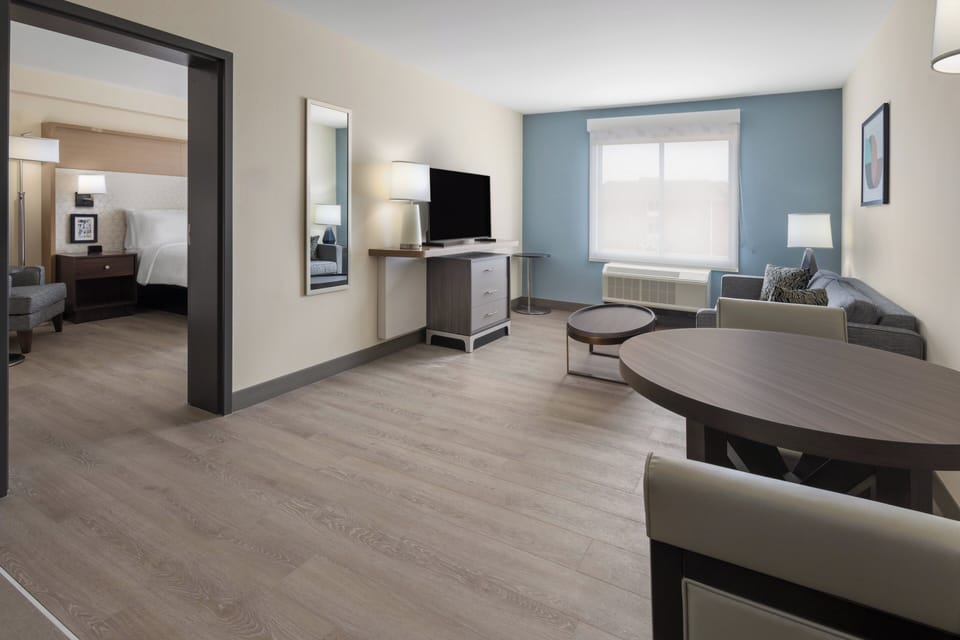 Hypo-allergenic bedding available, in-room safe, desk, laptop workspace