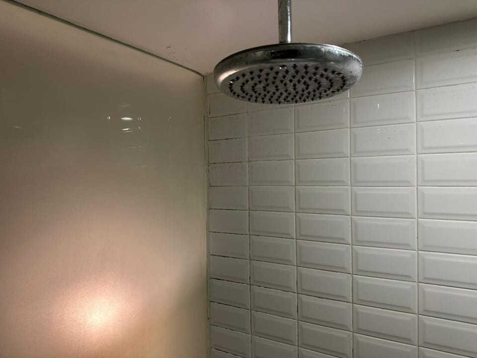 Shower, rainfall showerhead, free toiletries, slippers
