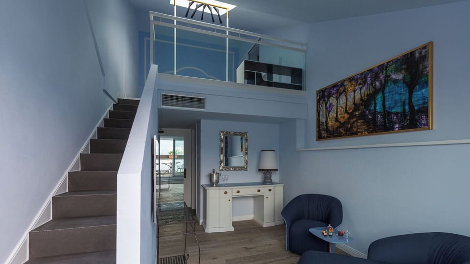 Premier Suite, Lake View | Down comforters, minibar, in-room safe, desk