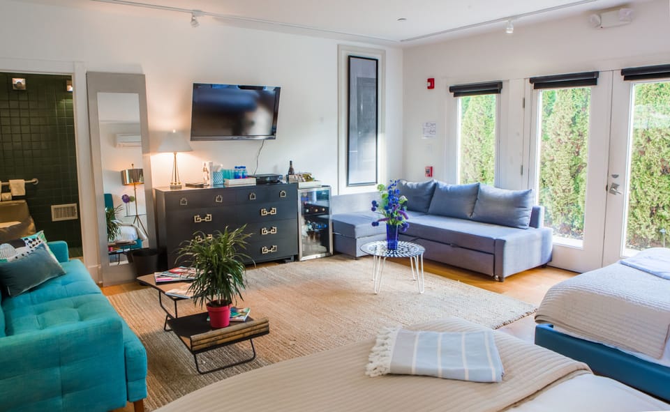 Garden Suite, Wheelchair Accessible, Ground Floor, 2 Queen Beds, Non-Smoking | Premium bedding, minibar, soundproofing, iron/ironing board