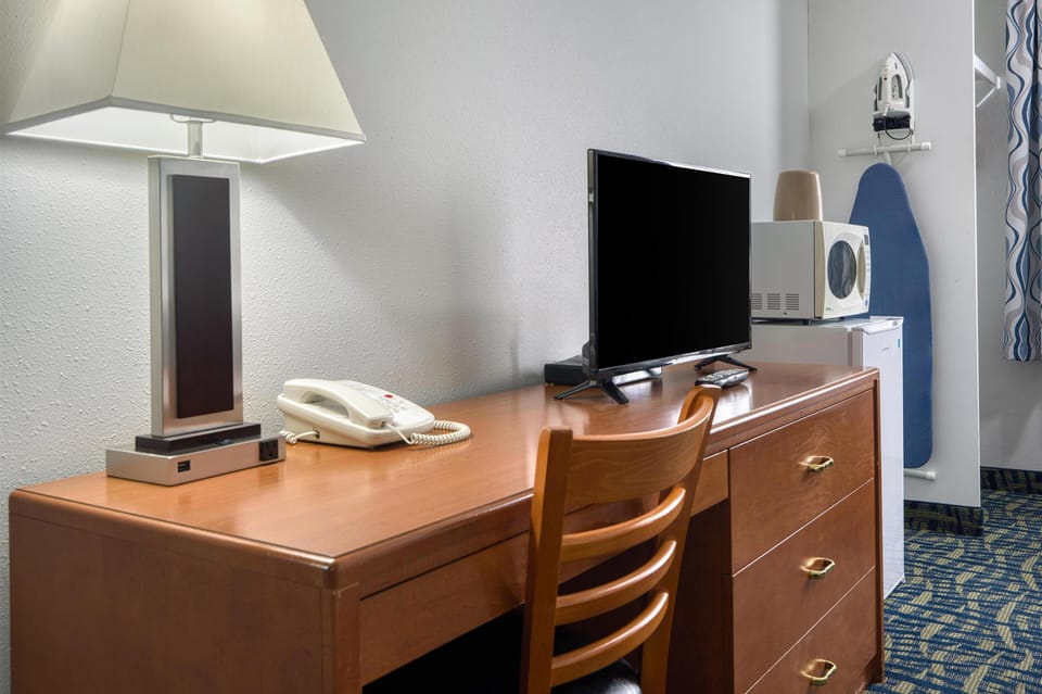 Standard Room, 1 Queen Bed, Non Smoking, Refrigerator & Microwave (Refrigerator & Microwave) | Desk, laptop workspace, blackout drapes, iron/ironing board