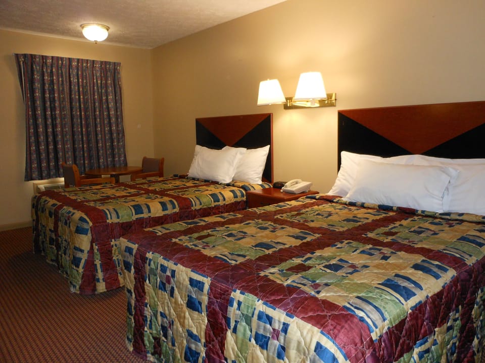 Premium bedding, down comforters, desk, laptop workspace