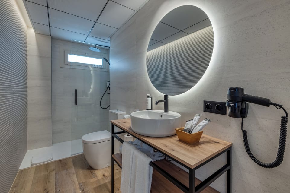 Bathtub, deep soaking tub, eco-friendly toiletries, hair dryer