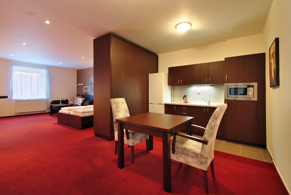 Apartment, 1 Bedroom (2 Adults) | In-room safe, desk, blackout drapes, iron/ironing board