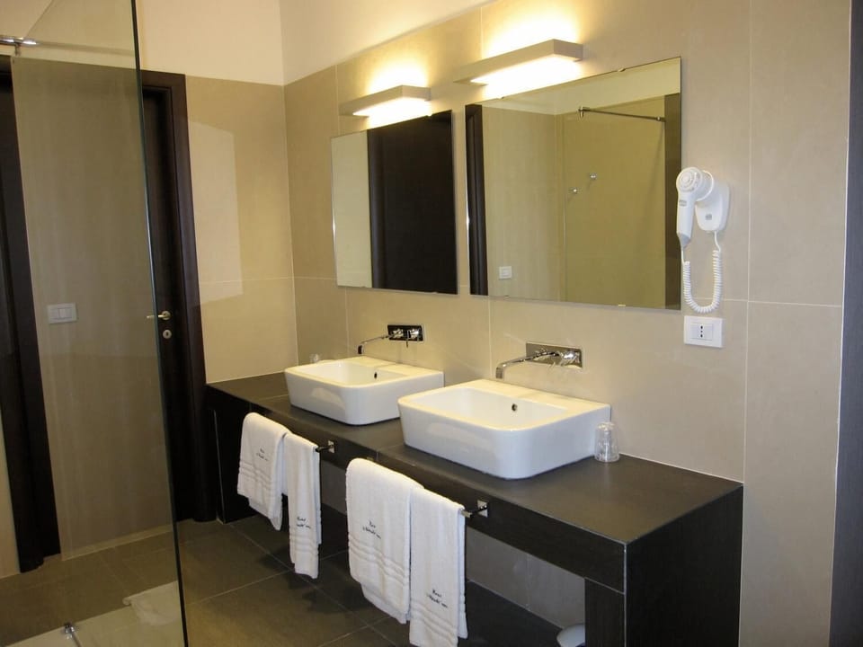 Shower, free toiletries, hair dryer, slippers