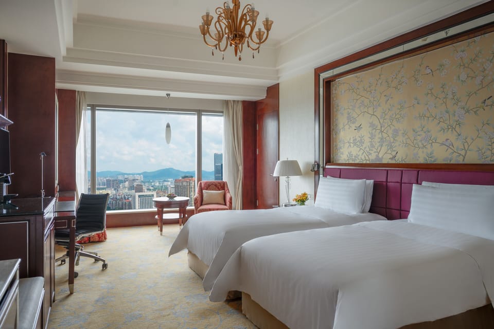 Premium bedding, down comforters, free minibar items, in-room safe