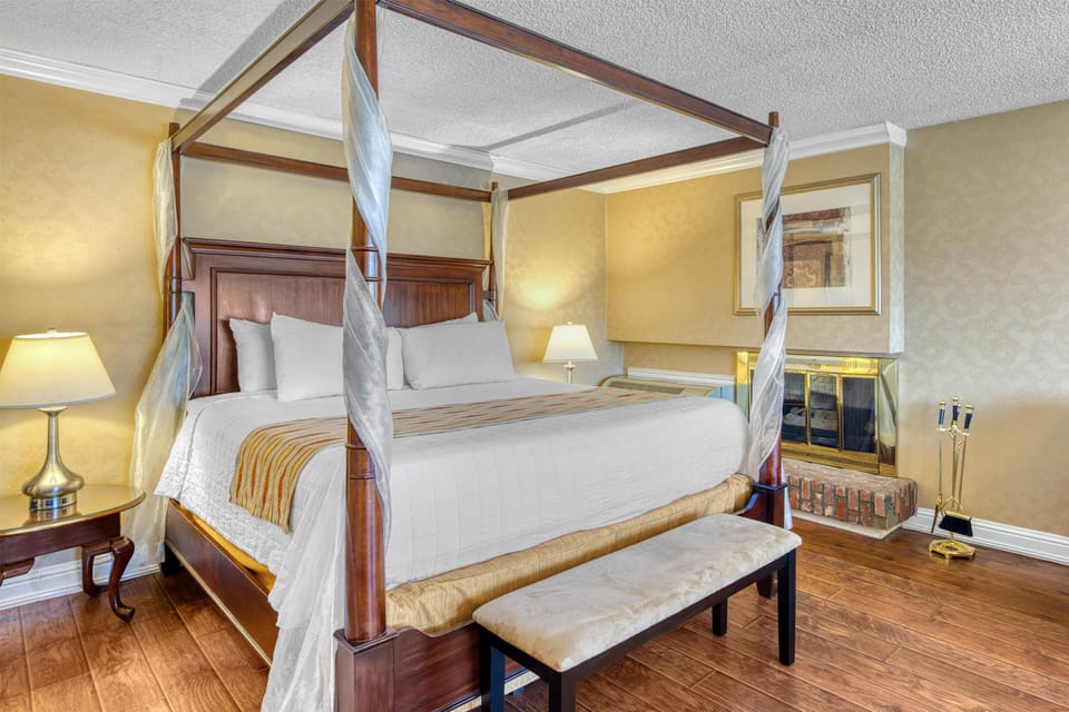 Suite, 1 King Bed, Non Smoking, Jetted Tub (Four Poster Bed) | Premium bedding, blackout drapes, iron/ironing board