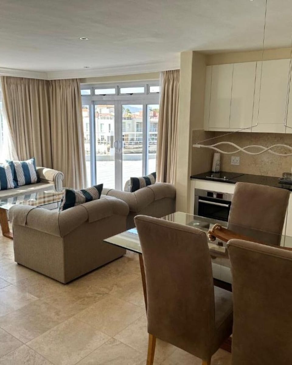Self Catering Suite Marina view | Living area | Flat-screen TV