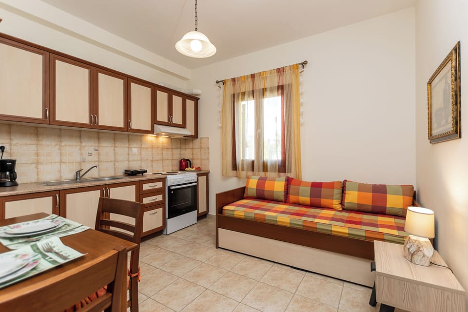 Apartment, Balcony, Partial Sea View | Private kitchen | Fridge, oven, stovetop, coffee/tea maker